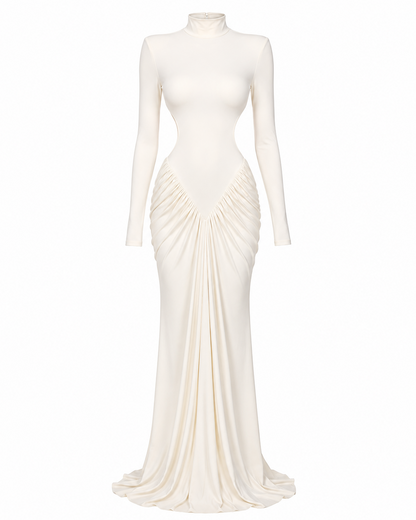An off-white long-sleeve mock neck maxi dress with a draped, gathered waist and a slight train, displayed on a mannequin against a solid white background.