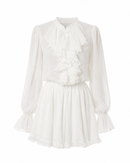 A white long-sleeve blouse with a high ruffled collar, bow at the neckline, gathered sleeves with ruffled cuffs, and a flared skirt, shown on a plain white background.