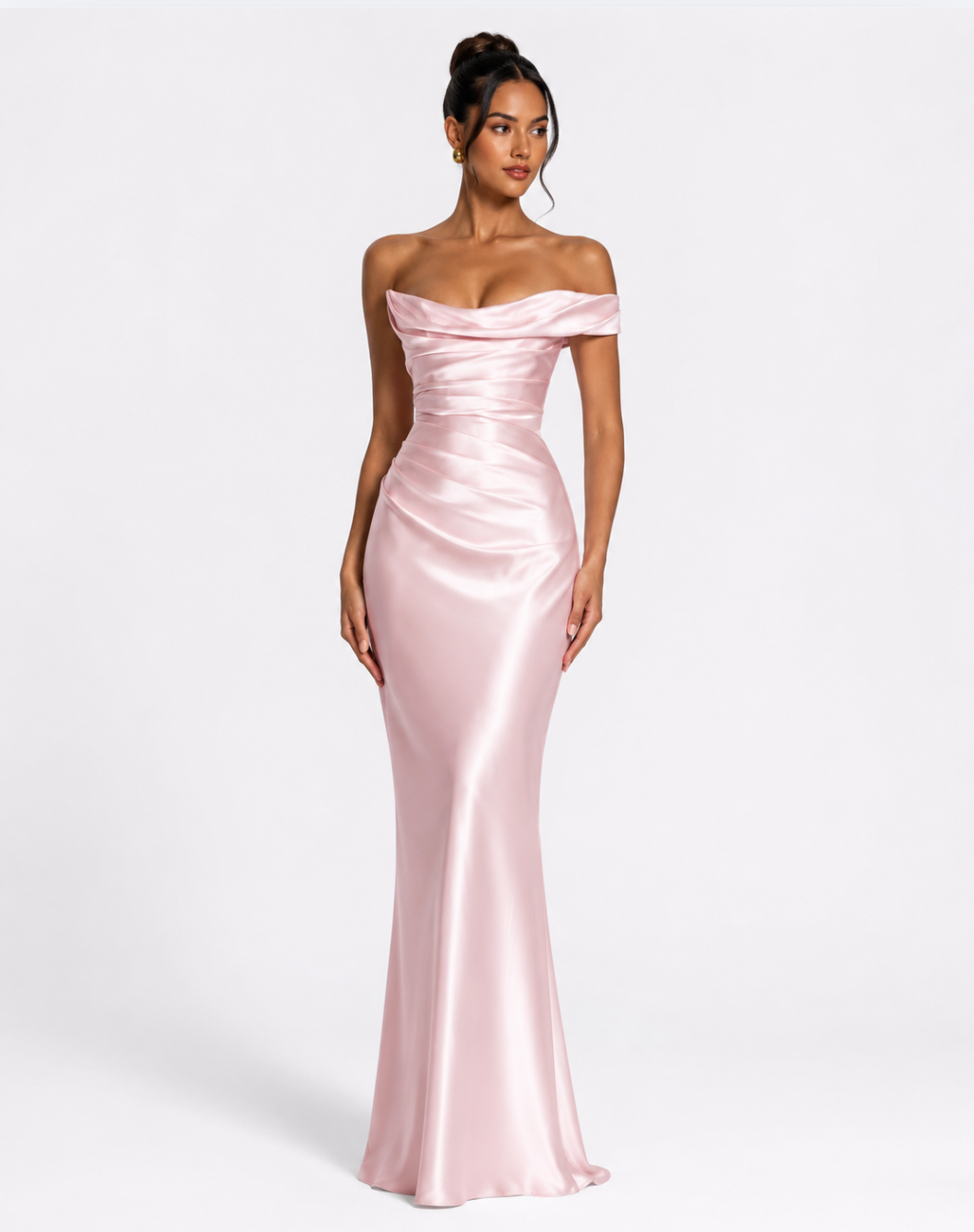 Woman wearing a pink strapless gown on a white background